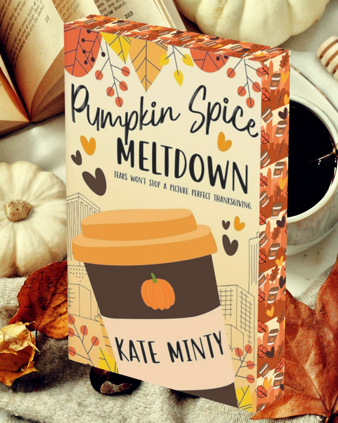 Book titled 'Pumpkin Spice Meltdown' by Kate Minty with autumn-themed cover and edges