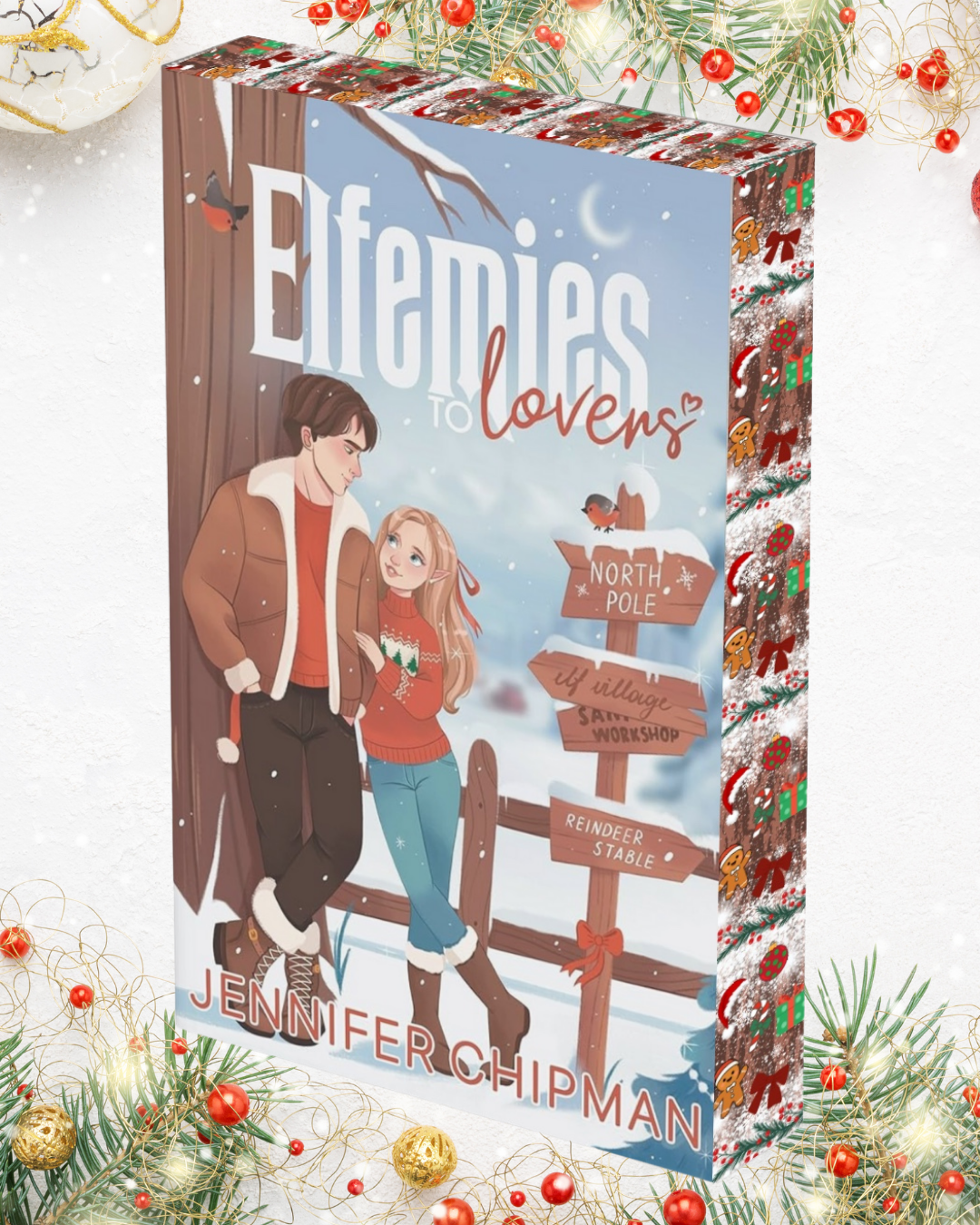 Book cover of 'Enemies to Lovers' by Jennifer Chipman with Christmas decorations.